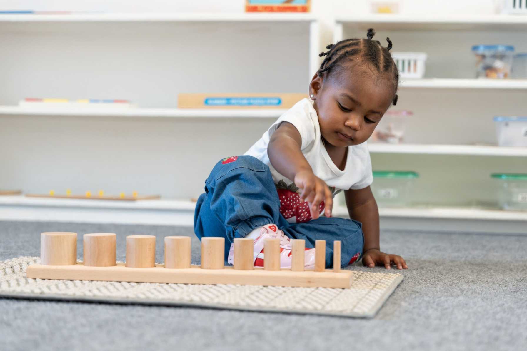Kid playing with tower