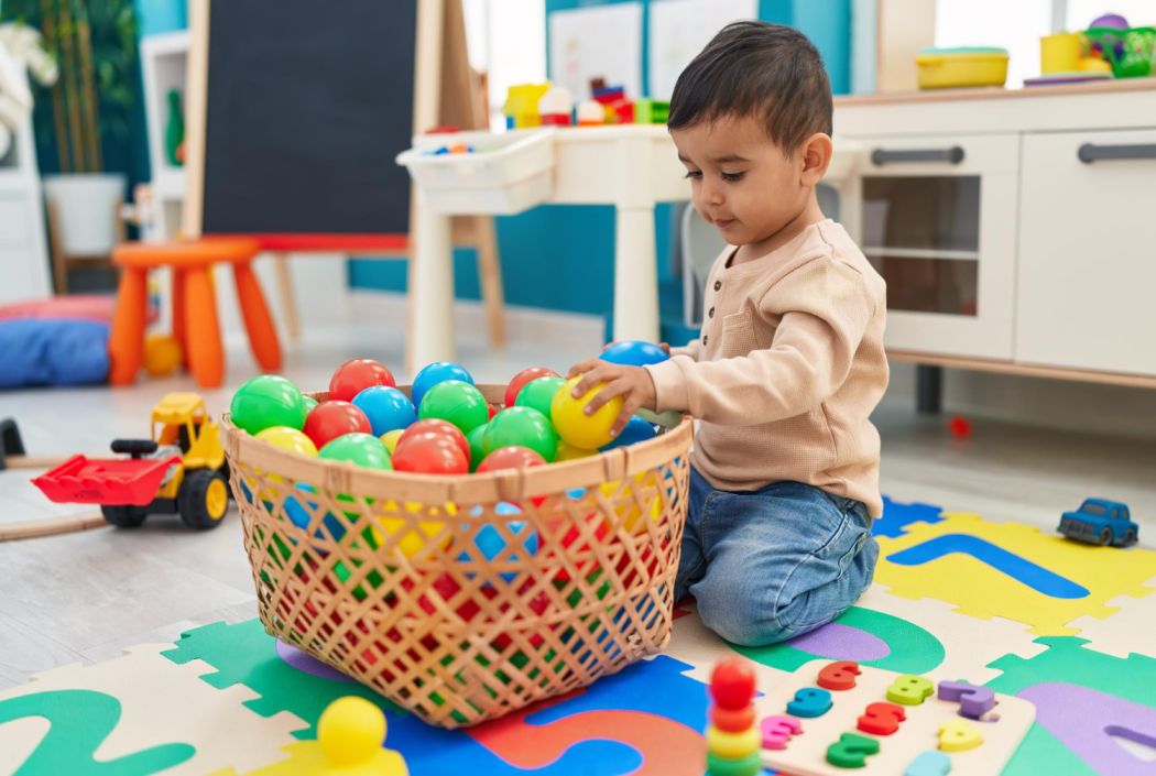 Kid playing with ball